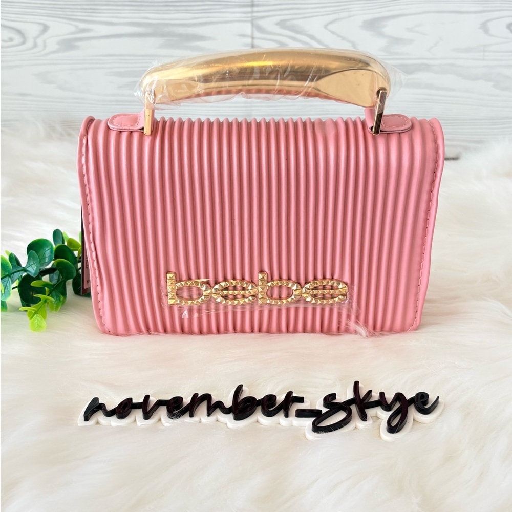 Bebe “Raelynn” Metal Handle Crossbody